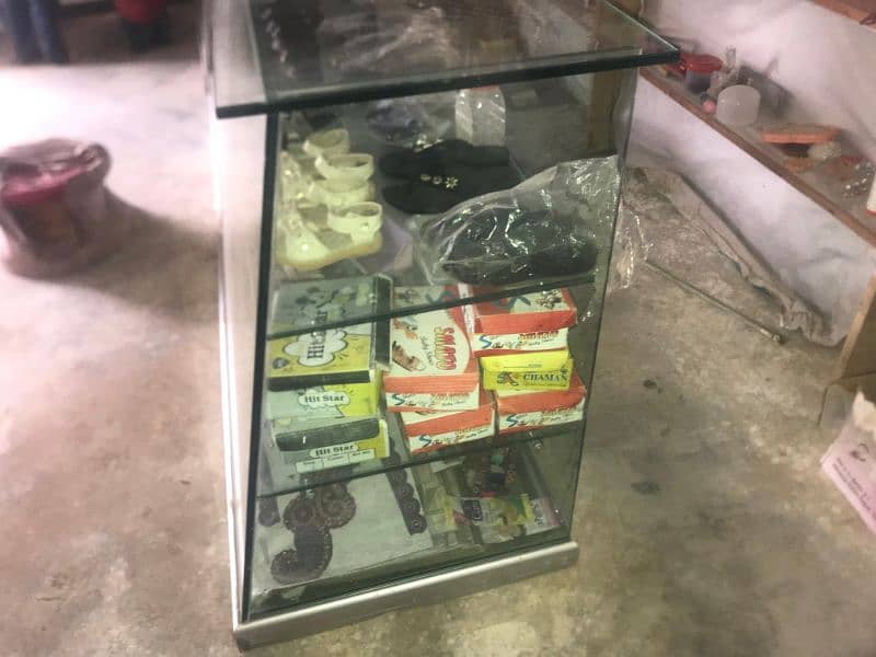 counter for shop made by 12mm glass with alminium base frame 3 pieces 1