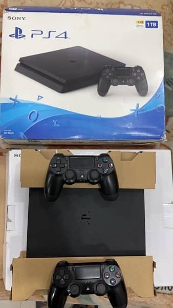 Playstation 4 1TB, With 1 CD 2 controllers cables and box 0