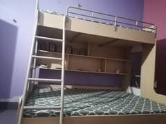 Bunk Bed, double bed on bottom and single bed on first floor.