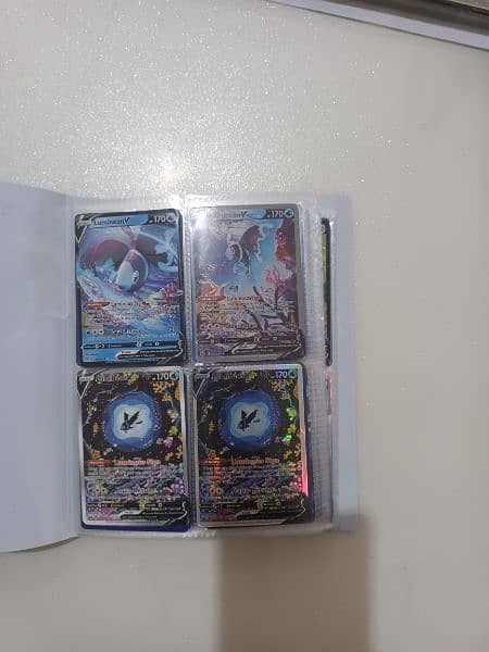 non repeated pokemon cards (v and ex) plus album 1
