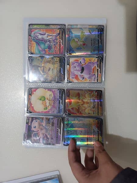 non repeated pokemon cards (v and ex) plus album 15