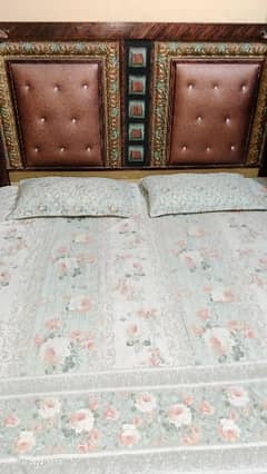 Bed with mattress and dressing