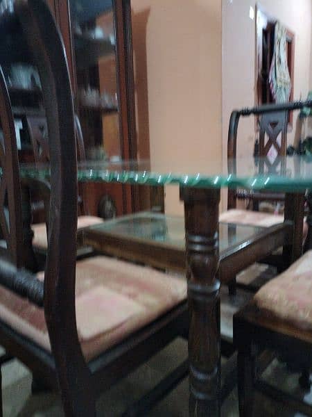 wooden frame dinning table with solid glass top with 4 chairs 6