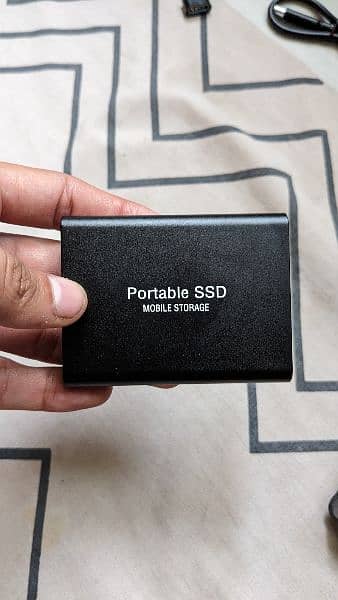 1 TB PORTABLE SSD DRIVE 0