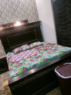 solid wood bed available for sale