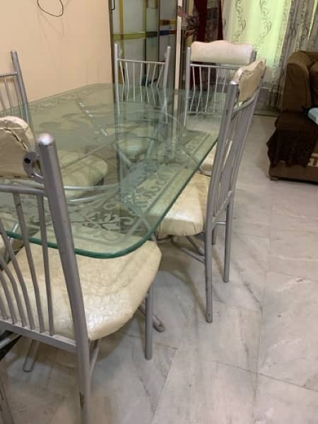 Glass dining table for sale With 6 chairs 0
