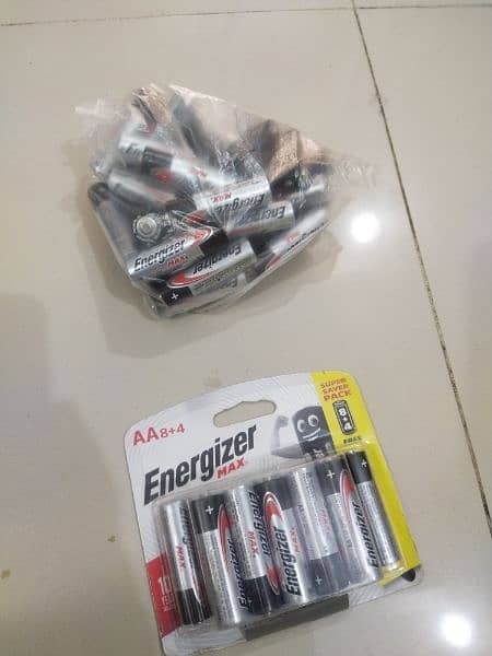 energizers batteries, apple magic mouse and handfree 8