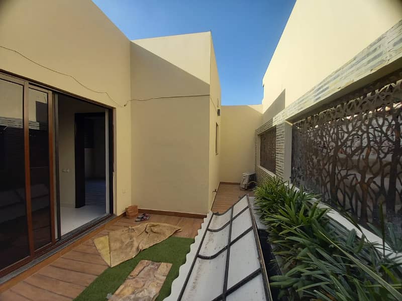 7.15 marla slightly use modern design fully basment semi furnished beautiful bungalow for sale in DHA phase 6 block D 12
