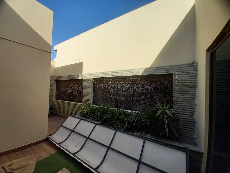 7.15 marla slightly use modern design fully basment semi furnished beautiful bungalow for sale in DHA phase 6 block D 13