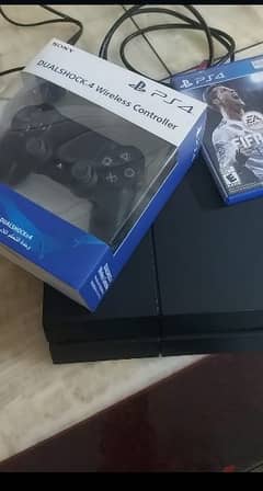 PS4 FAT WITH 2 FREE GAMES