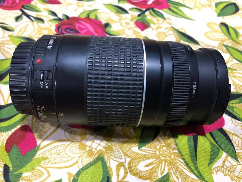 Canon 70-300 Zoom lens slighty used perfectly working 6