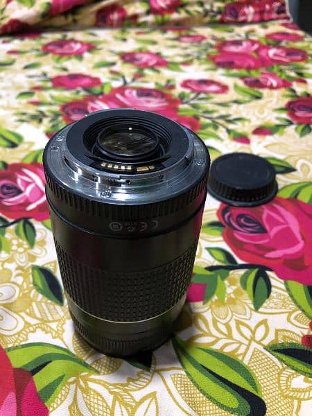 Canon 70-300 Zoom lens slighty used perfectly working 7
