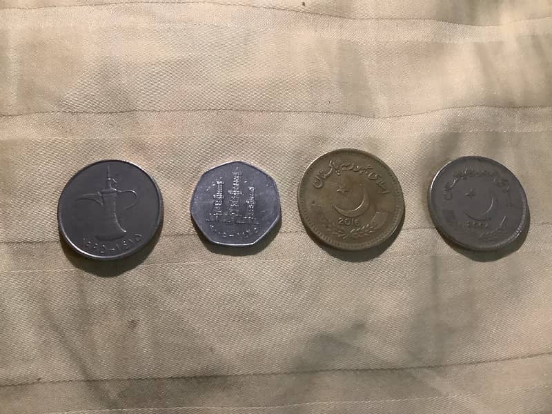 different coins of pakistani and dubai darhams coin 0