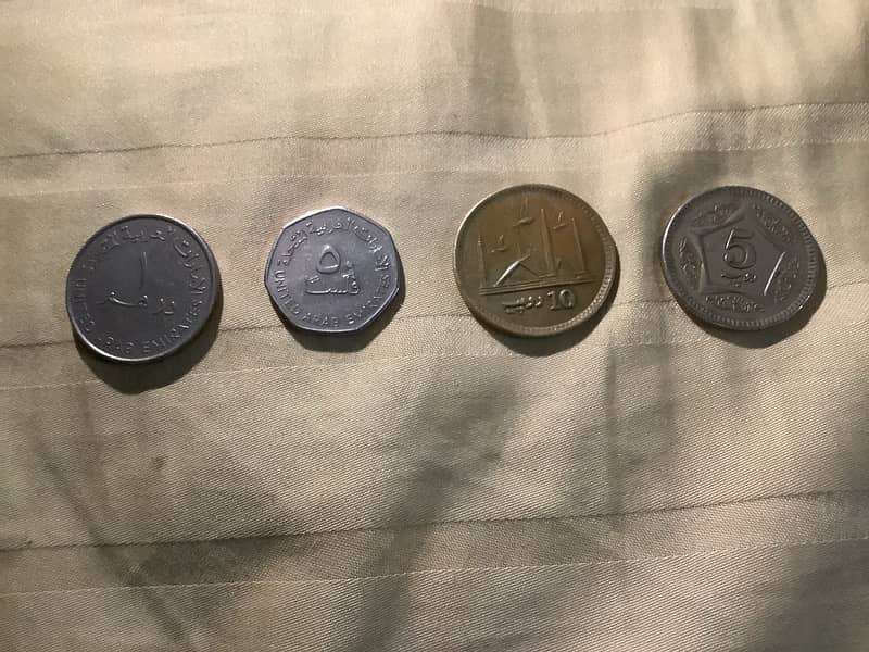 different coins of pakistani and dubai darhams coin 1