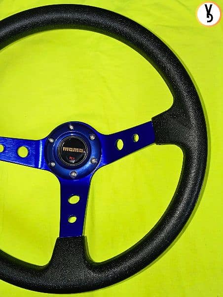 MOMO DEEP DISH STEERING WHEEL IS AVAILABLE FOR SALE AT VOGUEGARAGEPK 4