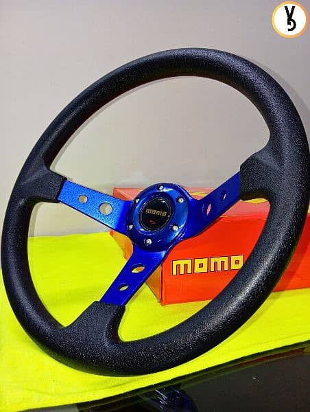 MOMO DEEP DISH STEERING WHEEL IS AVAILABLE FOR SALE AT VOGUEGARAGEPK 9