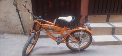 bicycle in orange color all done no problom for sell