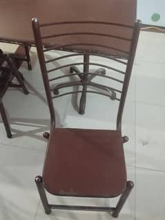 Maroon wooden dining table with 6chairs good condition