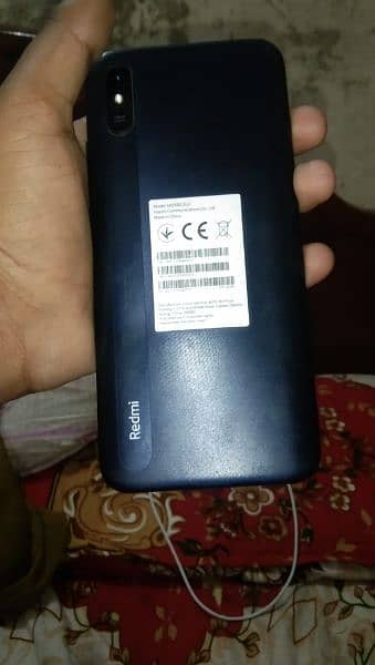 Redmi 9a 1 week used charger or box bhi hai 1