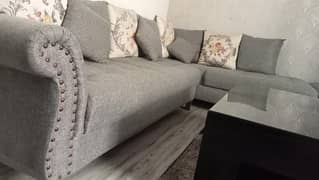 7 seater L shaped Sofa in Charcoal grey colour and Table