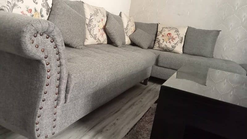 7 seater L shaped Sofa in Charcoal grey colour me 0