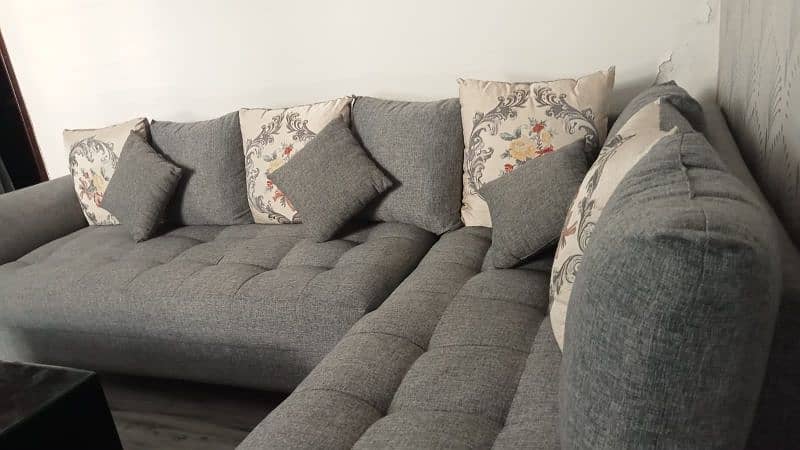 7 seater L shaped Sofa in Charcoal grey colour me 2