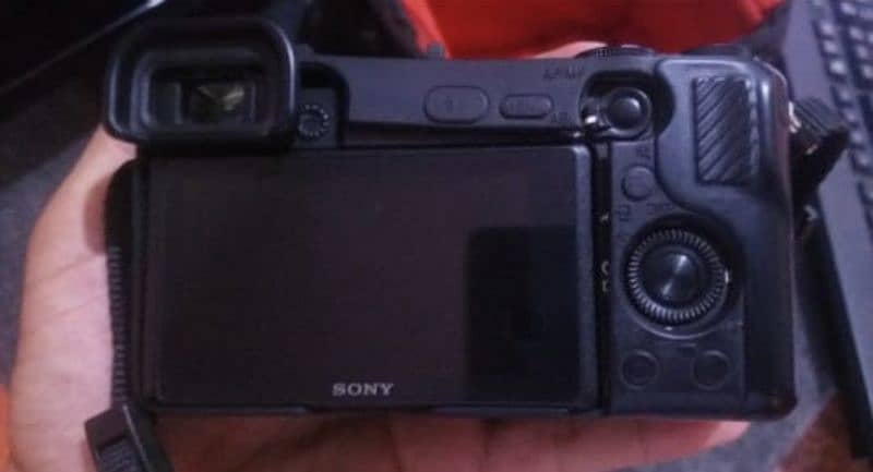 Sony @6400 With Sigma 30 mm Lens and Batteries Charger 2