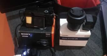 Sony @6400 With Sigma 30 mm Lens and Batteries Charger