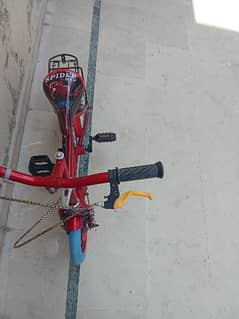 kids bicycle in almost brand new condition is for sale in DHA-2 ISL