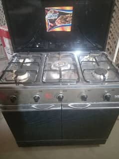 Cooking range 5 burner with 2 cabins it's new