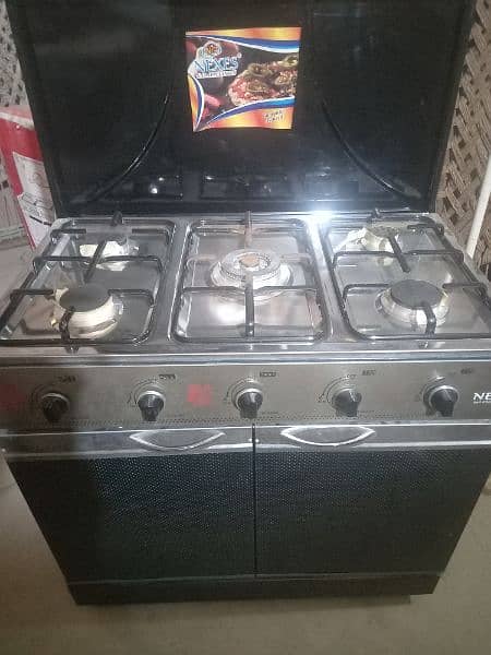 Cooking range 5 burner with 2 cabins it's new 0