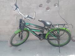 streethawak kids bicycle in green colour.