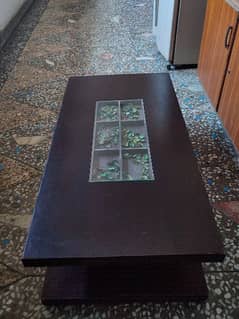 solid wooden center table in good condition 0