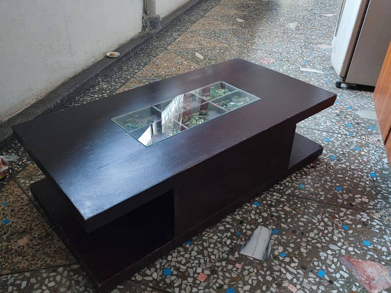 solid wooden center table in good condition 2