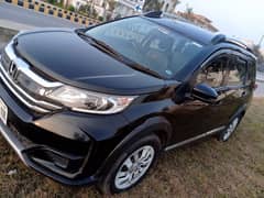 Honda br-v rent a car Faisalabad and tour booking ke liye raabta Karen
