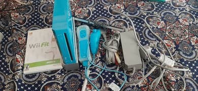 nintendo wii blue edition with motion controller