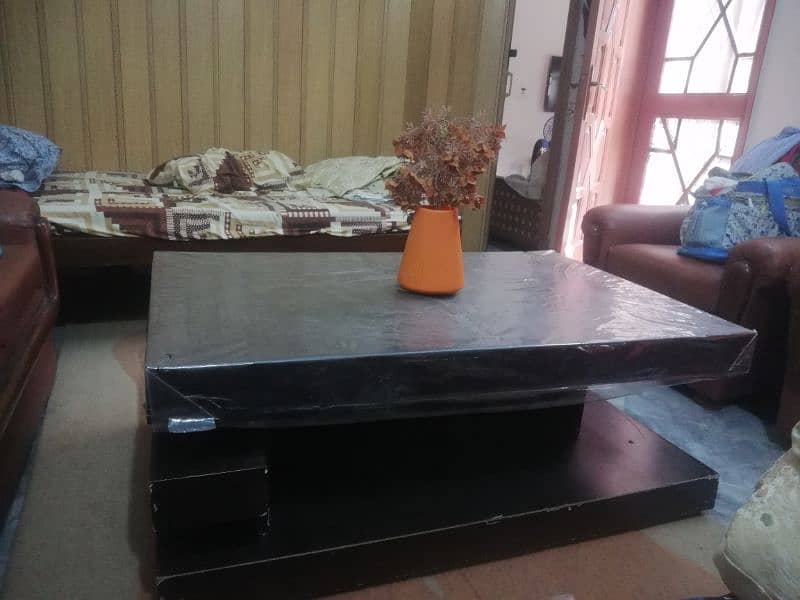 stylish and modern wooden table. price is negotiable. 1