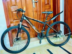 imported Sport's XMX aluminum branded bicycle 0