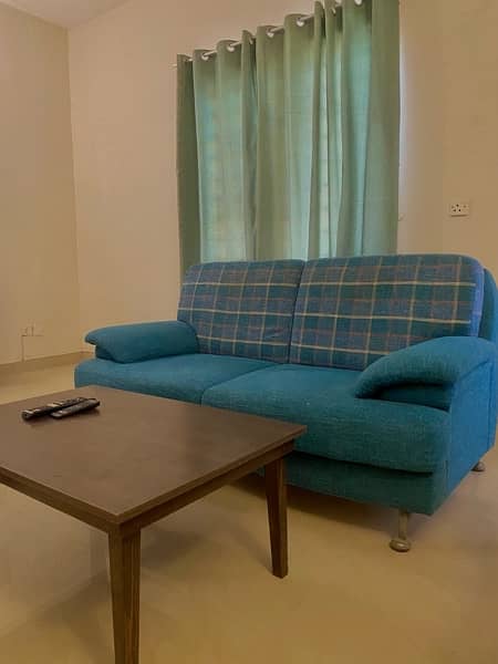Blue sofa 2 seater (9/10) condition 0