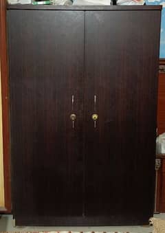 1 two door wooden cupboard 0