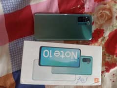 Ridmi Note 10 4Gb Ram 128 GB Rom good condition with box charg. . .