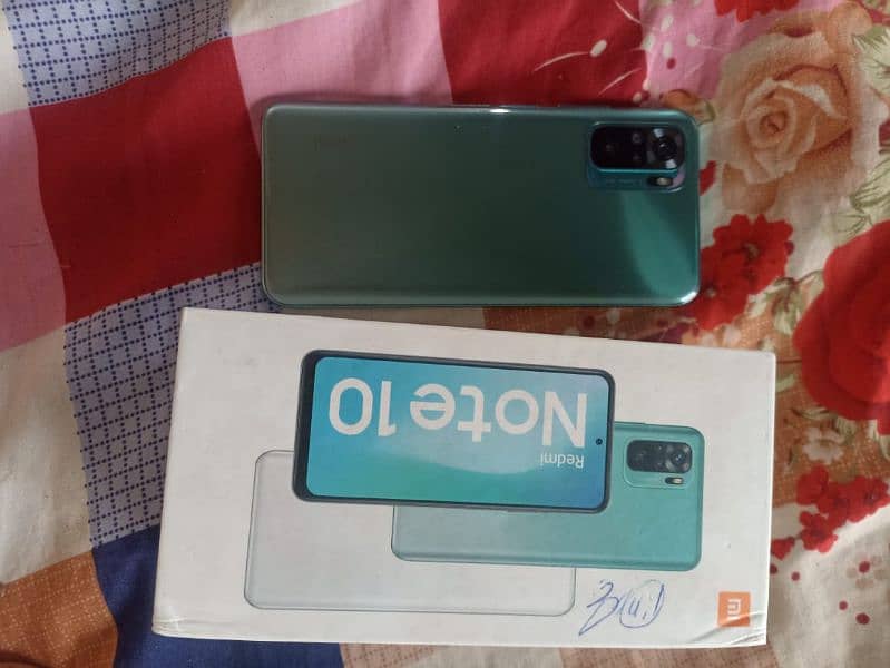 Ridmi Note 10 4Gb Ram 128 GB Rom good condition with box charg. . . 0