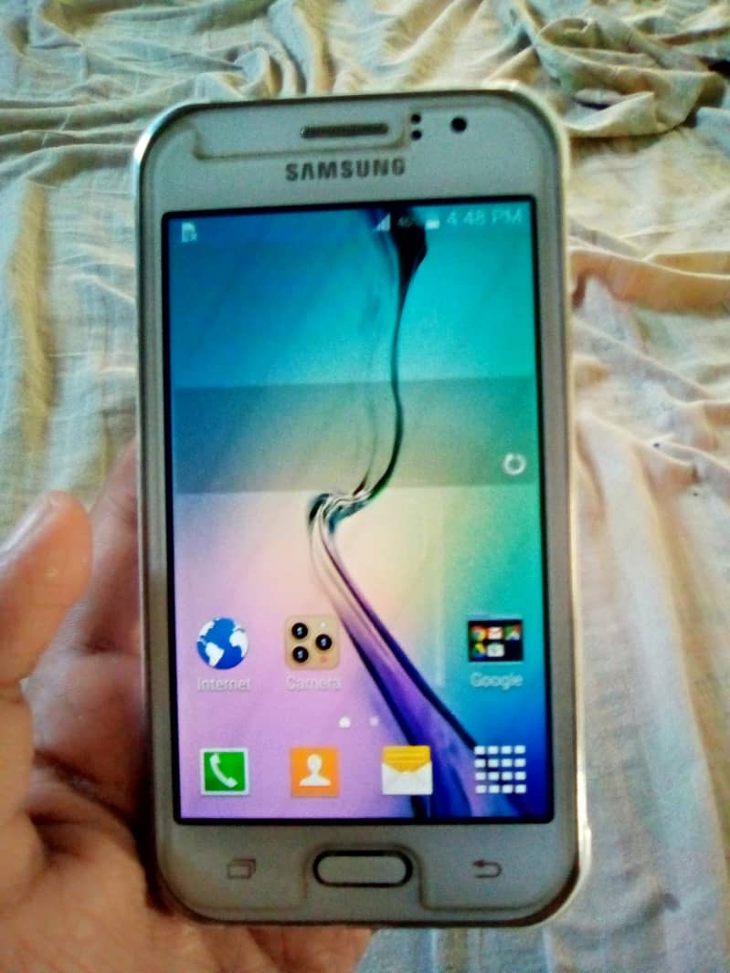 Samsung Galaxy J1 ace 4