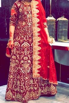 elegant bridal dress in bright mehroon colour
