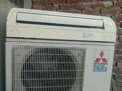 "Efficient Cooling with Mitsubishi Mr. Slim 1.5 Ton AC: Beat the Heat