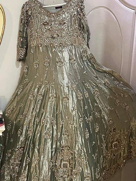 bridel dress full heavy jellwry work made in golden zari brand 1