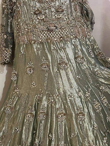 bridel dress full heavy jellwry work made in golden zari brand 2