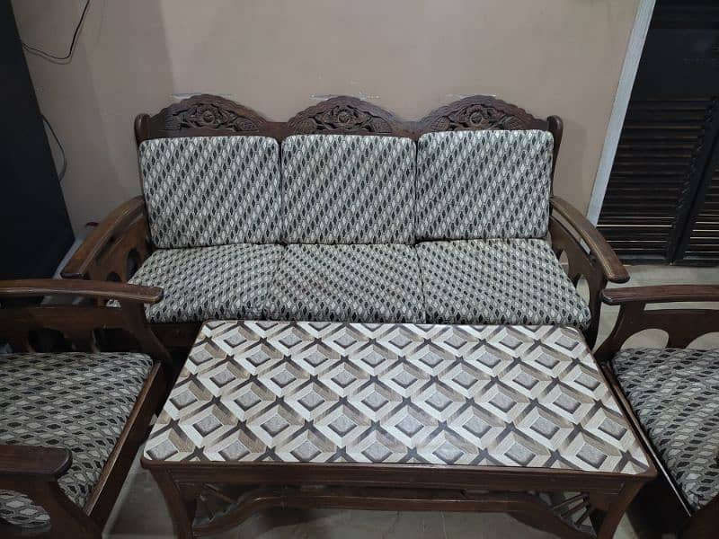 WOODEN SOFA SET WITH TABLE. 1