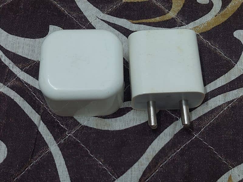 Iphone original chargers without cables 
4500 each 3