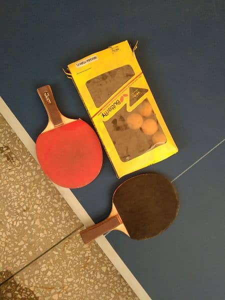 table tennis table,rackets and balls 3